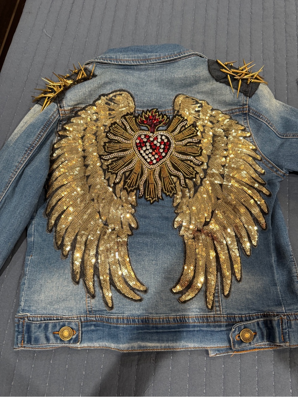 Woman Denim Jacket with Gold Sequin Wing Embellishment
